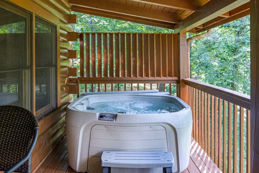 Mountain Mist hot tub on a covered deck overlooking trees